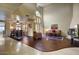 Spacious living room with vaulted ceilings and an adjacent dining area at 6411 S River Dr # 26, Tempe, AZ 85283
