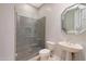 Bathroom with glass shower and pedestal sink at 6486 E Oberlin Way, Scottsdale, AZ 85266