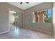 Bedroom with mirrored closet and desert view at 6486 E Oberlin Way, Scottsdale, AZ 85266