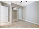 Bright bedroom with mirrored closet and tile floors at 6486 E Oberlin Way, Scottsdale, AZ 85266