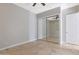 Bedroom with mirrored closet doors and tile floors at 6486 E Oberlin Way, Scottsdale, AZ 85266