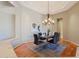 Elegant dining room with chandelier and hardwood floors at 6486 E Oberlin Way, Scottsdale, AZ 85266