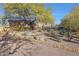 Landscaped front yard with desert plants at 6486 E Oberlin Way, Scottsdale, AZ 85266