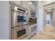 Stainless steel appliances and ample cabinetry in this kitchen at 6486 E Oberlin Way, Scottsdale, AZ 85266