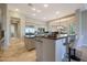 Modern kitchen with large island and breakfast bar at 6486 E Oberlin Way, Scottsdale, AZ 85266