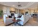 Spacious living room with fireplace and ample natural light at 6486 E Oberlin Way, Scottsdale, AZ 85266