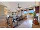 Bright living room showcasing a cozy seating area and pool view at 6486 E Oberlin Way, Scottsdale, AZ 85266