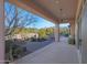 Covered patio overlooking a refreshing pool and desert landscape at 6486 E Oberlin Way, Scottsdale, AZ 85266