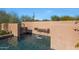 Waterfall detail on the inviting swimming pool at 6486 E Oberlin Way, Scottsdale, AZ 85266