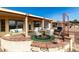 Inviting patio with seating area and built-in BBQ grill at 1211 E Torrey Pines Ln, Chandler, AZ 85249