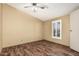 Bright bedroom with wood-look floors and window shutters at 16246 N 32Nd Way, Phoenix, AZ 85032