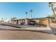 Single-story home with carport and desert landscaping at 16246 N 32Nd Way, Phoenix, AZ 85032