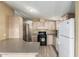 Open kitchen with light wood cabinets and ample counter and cabinet space at 16246 N 32Nd Way, Phoenix, AZ 85032