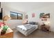 Serene bedroom with mountain view, and mid-century modern decor at 2343 E Orangewood Ave, Phoenix, AZ 85020