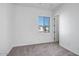 Simple bedroom with carpet and a window offering natural light at 20105 W Campbell Ave, Buckeye, AZ 85396