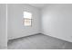 Simple bedroom with neutral walls and carpet flooring at 20105 W Campbell Ave, Buckeye, AZ 85396