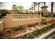 View of the Verrado Golf Club entrance sign with manicured landscaping and clubhouse in the background at 20105 W Campbell Ave, Buckeye, AZ 85396