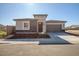 Single-story home with a two-car garage and stone accents at 20105 W Campbell Ave, Buckeye, AZ 85396