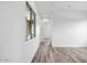 Hallway with wood-look flooring and a window at 20105 W Campbell Ave, Buckeye, AZ 85396