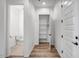 Hallway with linen closet and powder room at 20105 W Campbell Ave, Buckeye, AZ 85396