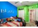 bedroom with blue and green walls, and stuffed animals at 31101 N 136Th Ln, Peoria, AZ 85383