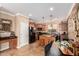 Modern kitchen with stainless steel appliances and copper backsplash at 31101 N 136Th Ln, Peoria, AZ 85383