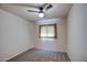 Bright bedroom with neutral carpeting and window coverings at 3753 S Mill Ave, Tempe, AZ 85282