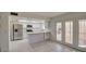 Modern kitchen featuring stainless steel appliances and a breakfast bar at 3753 S Mill Ave, Tempe, AZ 85282