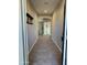 Bright entryway with tile floors and coat rack at 49005 N 7Th Ave, New River, AZ 85087