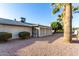 Back exterior view of house with screened patio at 5022 E Magic Stone Dr, Phoenix, AZ 85044