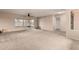 Living room with sliding glass doors and view of the backyard at 5022 E Magic Stone Dr, Phoenix, AZ 85044