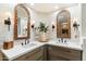 Elegant bathroom featuring double vanity and ornate mirrors at 6501 E Cholla St, Scottsdale, AZ 85254