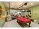 Pool table in a spacious game room with mountain mural at 6501 E Cholla St, Scottsdale, AZ 85254