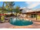 Expansive pool and patio area with lush landscaping at 6501 E Cholla St, Scottsdale, AZ 85254