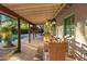 Relaxing poolside patio with a long wooden dining table at 6501 E Cholla St, Scottsdale, AZ 85254