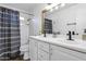 Bathroom with double vanity and updated fixtures at 6842 W Holly St, Phoenix, AZ 85035