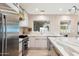 Sleek kitchen featuring stainless steel appliances and a stylish backsplash at 7637 N 6Th Ave, Phoenix, AZ 85021