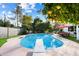 Inviting kidney-shaped pool with diving board, surrounded by a patio at 7637 N 6Th Ave, Phoenix, AZ 85021