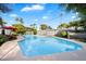 Sparkling blue pool perfect for summer fun, surrounded by a large patio at 7637 N 6Th Ave, Phoenix, AZ 85021