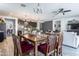 Casual dining area with a wooden table and maroon chairs at 1358 N St Paul --, Mesa, AZ 85205