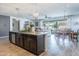 Open kitchen island with granite countertops and dark cabinetry at 1358 N St Paul --, Mesa, AZ 85205