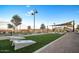 Community park with walking path, green space, benches and covered playground equipment at 3923 E Archer Dr, San Tan Valley, AZ 85140