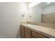 Bathroom with a large mirror, a tile countertop, and a shower at 3948 W Salter Dr, Glendale, AZ 85308