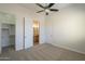 Cozy bedroom with closet and en suite bathroom at 3948 W Salter Dr, Glendale, AZ 85308