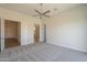 Spacious bedroom with an en suite bath and multiple closets for ample storage at 3948 W Salter Dr, Glendale, AZ 85308