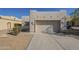 Charming home featuring a two-car garage and well-maintained desert landscaping at 3948 W Salter Dr, Glendale, AZ 85308