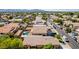 Aerial view showing home's location, pool, and surrounding neighborhood at 16209 W Davis Rd, Surprise, AZ 85374