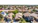 Aerial view of house, showcasing neighborhood and surrounding landscape at 16209 W Davis Rd, Surprise, AZ 85374