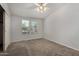 Bedroom with carpet, white walls, and a closet at 215 N Power Rd # 361, Mesa, AZ 85205