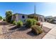 Charming single-story home with covered parking and attractive, low-maintenance desert landscaping at 215 N Power Rd # 361, Mesa, AZ 85205